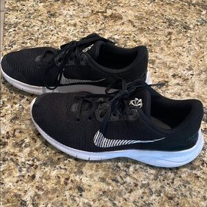Nike Black Mesh Sneakers with White Swoosh